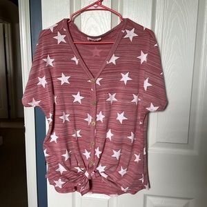 Medium like new V-neck stars top bought at Mainstream Boutique